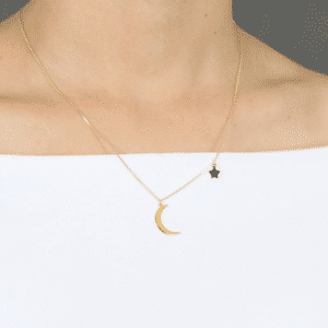 14K Yellow Gold Crescent Moon and Star Necklace Set on Neck
